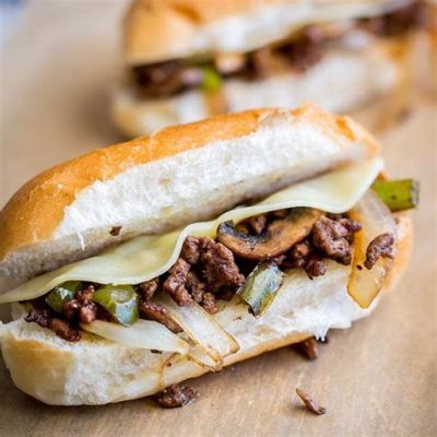  Philly Cheesesteak: อร่อยนุ่มละมุนลิ้น สัมผัสความลงตัวของเนื้อย่างหอมกรุ่นและชีสเยิ้มๆ